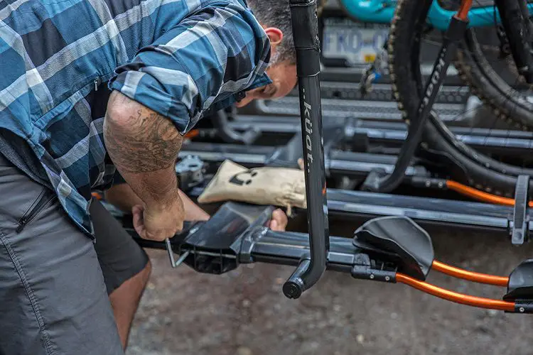 Tools and equipment needed to install a bicycle rack on a car